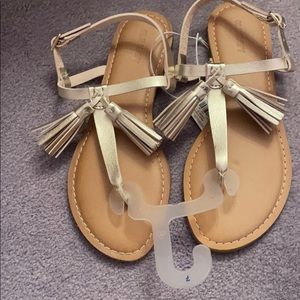 Old Navy size 7 gold tasseled sandals